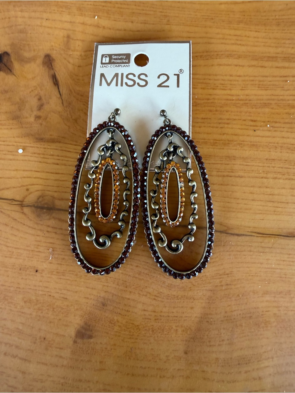 Miss 21 Brown Oval Drop Earrings with Amber Center